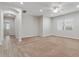 Spacious carpeted bedroom with ample natural light, ceiling fan, and neutral decor, offering a comfortable retreat at 4426 E Leroy St, Gilbert, AZ 85295