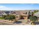 Inviting single-story home featuring a manicured front yard and attached two car garage at 4426 E Leroy St, Gilbert, AZ 85295