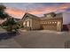 Beautiful single story home boasting a well-maintained front yard and two-car garage at 4426 E Leroy St, Gilbert, AZ 85295