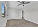 Bedroom featuring a view to the outside, plus closet at 4714 E Broadway Rd, Phoenix, AZ 85040