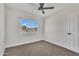 Bedroom featuring a window view to the outside at 4714 E Broadway Rd, Phoenix, AZ 85040