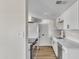 Modern kitchen featuring white cabinets, stainless steel appliances, and sleek countertops at 4714 E Broadway Rd, Phoenix, AZ 85040