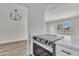 Bright, renovated kitchen area with stainless steel appliances and an open floor plan at 4714 E Broadway Rd, Phoenix, AZ 85040