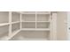 Storage room featuring open shelving for easy organization and accessibility at 6999 S Blue Hills Dr, Buckeye, AZ 85326