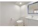 Powder bathroom with contemporary fixtures, sink, and clean finishes at 7376 E Via Estrella Ave, Scottsdale, AZ 85258