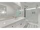 Bathroom with glass shower, marble countertop, and modern sink fixture at 7376 E Via Estrella Ave, Scottsdale, AZ 85258