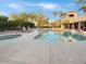 Community pool with lounge chairs and hot tub for residents to enjoy in a relaxing setting at 7376 E Via Estrella Ave, Scottsdale, AZ 85258