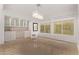 Bright dining room features tile floors, a built-in bar, and large windows for natural light at 7376 E Via Estrella Ave, Scottsdale, AZ 85258