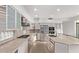 Modern kitchen with stainless steel appliances, granite countertops, and ample cabinet space at 7376 E Via Estrella Ave, Scottsdale, AZ 85258