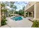 Backyard pool with nearby palm trees and patio at 7376 E Via Estrella Ave, Scottsdale, AZ 85258