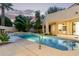 Backyard pool with nearby palm trees and patio at 7376 E Via Estrella Ave, Scottsdale, AZ 85258