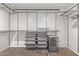 Custom walk-in closet with metal shelving and drawers for optimal storage at 7376 E Via Estrella Ave, Scottsdale, AZ 85258