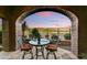 Balcony view of golf course with black metal safety fence and beautiful sunrise at 8139 E Club Village Dr, Gold Canyon, AZ 85118