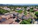 Charming homes feature tile roofs and desert landscaping in a vibrant community near the mountains at 8429 W Vernon Ave, Phoenix, AZ 85037