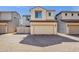 Charming home showcasing a two-car garage, neat landscaping, and a well-maintained facade at 8429 W Vernon Ave, Phoenix, AZ 85037