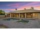 Backyard with a serene swimming pool and spa, perfect for relaxation and outdoor enjoyment at 9 E Los Arboles Cir, Tempe, AZ 85284