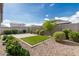 Beautiful backyard featuring desert landscaping and decorative gravel and hardscape at 9822 W Caron Dr, Peoria, AZ 85345