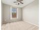 Bedroom featuring neutral walls and carpet, ceiling fan and a window with blinds at 9822 W Caron Dr, Peoria, AZ 85345