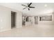 Open living room with access to the kitchen, great for entertaining guests at 9822 W Caron Dr, Peoria, AZ 85345
