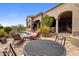 Beautiful backyard features a pool, patio with seating, and desert landscaping at 10511 E Skinner Dr, Scottsdale, AZ 85262