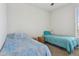 Bedroom featuring carpeted floor, two twin beds, and a window at 11142 E Ravenna Ave, Mesa, AZ 85212