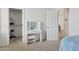 Bedroom with vanity and walk-in closet at 11142 E Ravenna Ave, Mesa, AZ 85212
