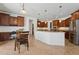 Spacious kitchen with stainless steel appliances, granite countertops, and ample cabinet space at 11142 E Ravenna Ave, Mesa, AZ 85212