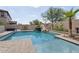 Backyard pool with desert landscaping and a slide feature at 11142 E Ravenna Ave, Mesa, AZ 85212