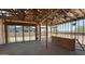 Framing shows the layout, with large sliding doors and windows offering light and views of the outdoor area at 11417 E Utah Ave, Mesa, AZ 85212