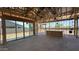 Framing shows the layout, with large sliding doors and windows offering light and views of the outdoor area at 11417 E Utah Ave, Mesa, AZ 85212