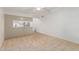 Open living area with tile flooring and ceiling fan at 1258 E Campus Dr, Tempe, AZ 85282