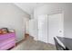 View of the bedroom with carpet floors, closet with sliding doors, and view of hallway at 13487 W Buckskin Trl, Peoria, AZ 85383