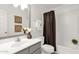 Bathroom features a modern vanity, neutral walls and shower with curtain at 13636 N Saguaro Blvd # 103, Fountain Hills, AZ 85268