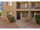 Charming condo featuring a private entrance, balcony, and well-maintained desert landscaping at 13636 N Saguaro Blvd # 103, Fountain Hills, AZ 85268