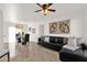 Bright living room and dining area with stylish furnishings, ceiling fan, and decorative accents at 13636 N Saguaro Blvd # 103, Fountain Hills, AZ 85268