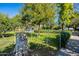 Tranquil view of a landscaped area with mature trees, lush greenery, and a clear view at 1482 S Banning St, Gilbert, AZ 85296