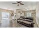 Spacious living area with dark floors, neutral walls, and a seamless transition to the kitchen at 1482 S Banning St, Gilbert, AZ 85296