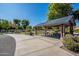 Covered picnic pavilion with seating, set in a well-maintained community park at 1482 S Banning St, Gilbert, AZ 85296