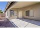 Backyard with covered patio and rock features at 15905 W Saguaro Ln, Surprise, AZ 85374