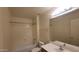 Well-lit bathroom with a tub-shower combination, featuring neutral tones and a functional layout at 15905 W Saguaro Ln, Surprise, AZ 85374