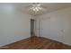 This bright bedroom has hardwood floors and closet perfect for any home at 15905 W Saguaro Ln, Surprise, AZ 85374