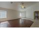 Bright living room with hard wood floors and lots of natural light at 15905 W Saguaro Ln, Surprise, AZ 85374