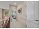 Bright hallway with views of bedrooms and natural light streaming in at 18045 W Rimrock St, Surprise, AZ 85388