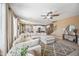 Comfortable living room shows off the easy access to the kitchen and the dining area at 18045 W Rimrock St, Surprise, AZ 85388