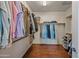 Walk-in closet featuring ample storage space and organization solutions at 18045 W Rimrock St, Surprise, AZ 85388