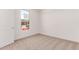 Bedroom with neutral carpet, window with view and a closet at 20262 W Monterey Way, Buckeye, AZ 85396