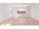 Ceramic tile flooring and natural light fill this room with great window views at 20262 W Monterey Way, Buckeye, AZ 85396