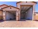 This 3-car garage features automatic doors, lighting, and epoxy floor at 20262 W Monterey Way, Buckeye, AZ 85396