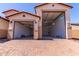 This 3-car garage features automatic doors, lighting, and epoxy floor at 20262 W Monterey Way, Buckeye, AZ 85396