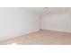 Bright living room featuring wood-look tile floors and recessed lighting at 20262 W Monterey Way, Buckeye, AZ 85396